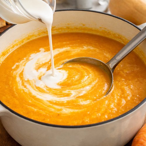 Step 5: Add Cream and Simmer to Desired Thickness